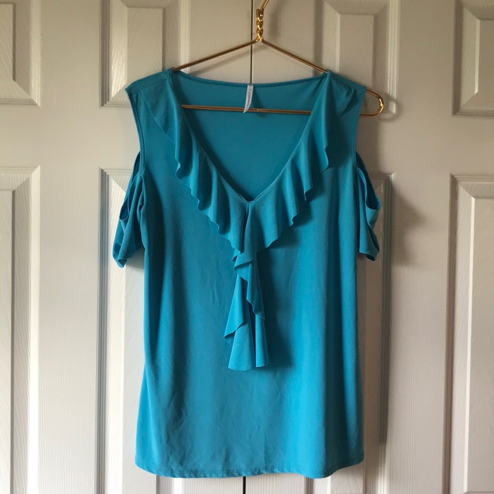 Cold shoulder shirt.